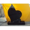 Hear black granite headstone